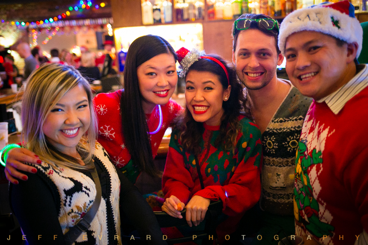 A group of people at The Ugly Christmas Sweater Party